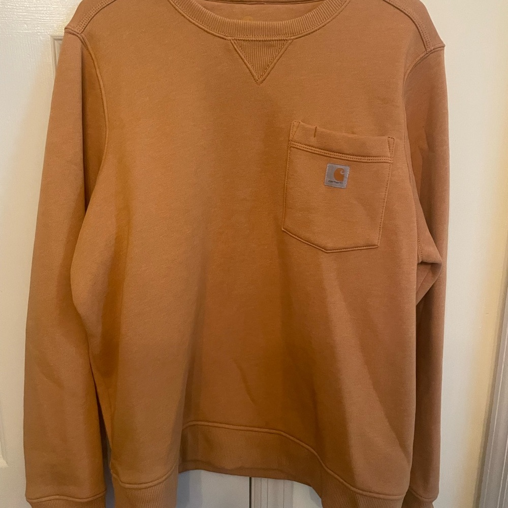 Super soft sweater. Muted orange/brown color